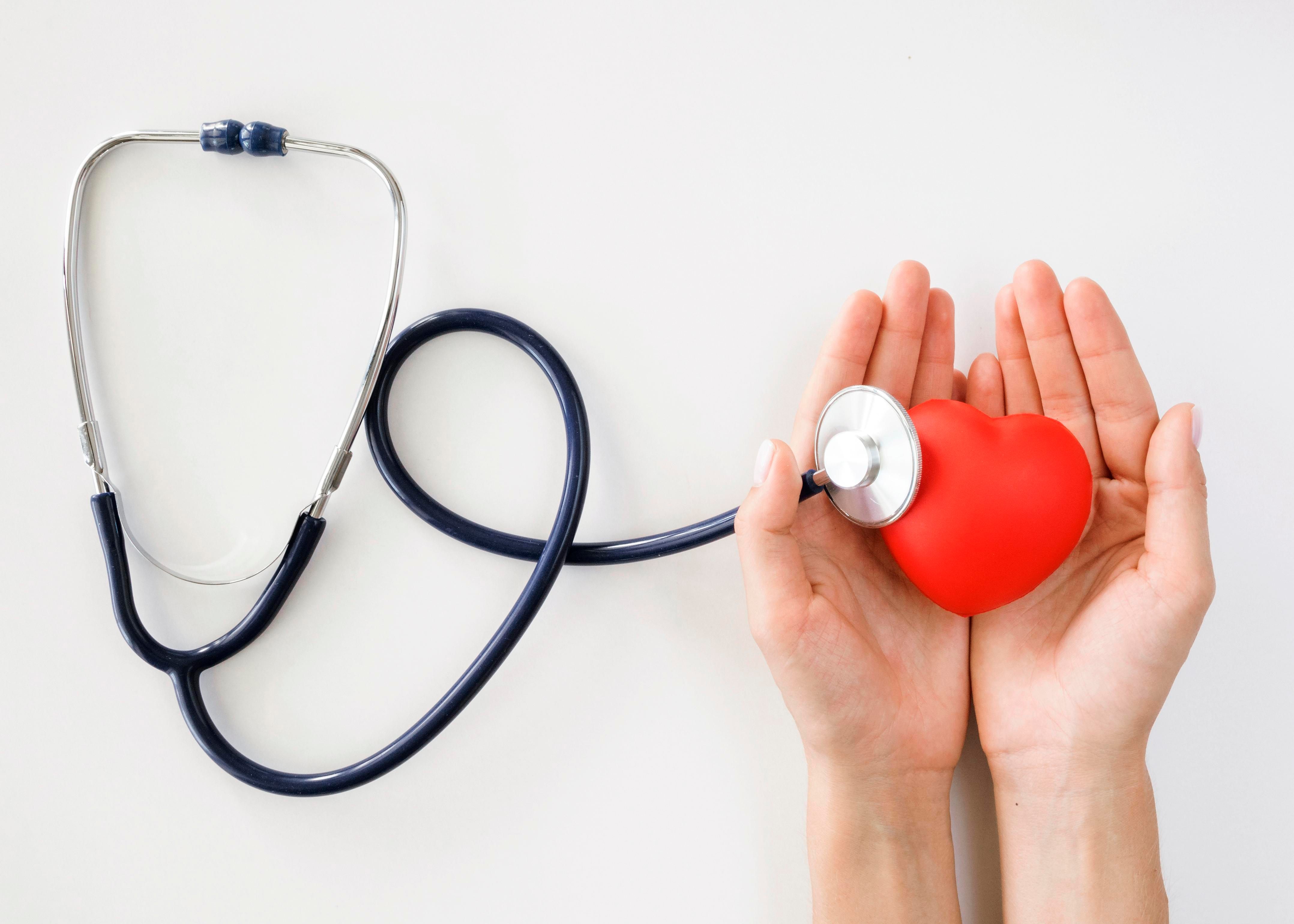 flat-lay-hands-holding-heart-shape-with-stethoscope.jpg